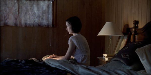 TRACY ON BED Drak Woods One Sheet
